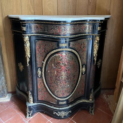 Small low buffet in blackened wood, with...