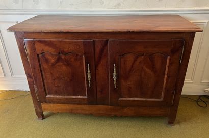 Low sideboard in fruitwood, with two doors....