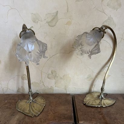 Pair of brass lamp bases with curved arms...