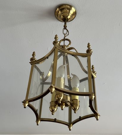 Varnished brass lantern with six curved sides...