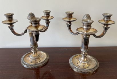 Pair of three-light table ends in silver-plated...