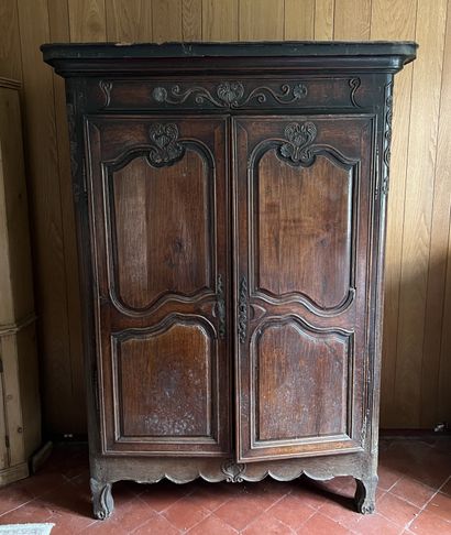 Small rustic armoire in molded fruitwood...