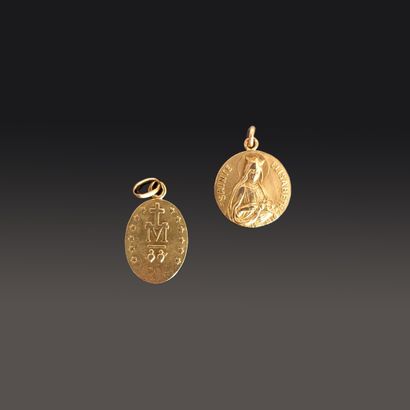 Two religious medals in 18K (750) yellow...