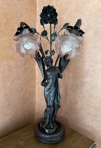 Lamp base in patinated metal featuring a...