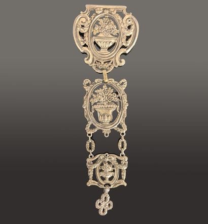 Antique gilded metal chatelaine, the three...