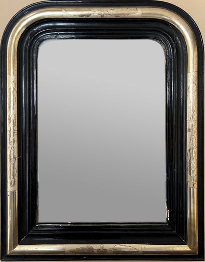 Small mirror with gilded and blackened wood...