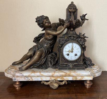 Clock in patinated regule and marble, the...