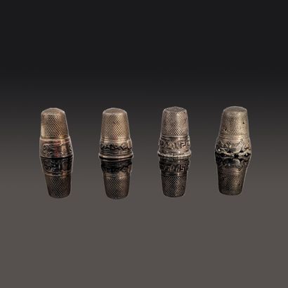 Four silver (925) sewing thimbles chased...