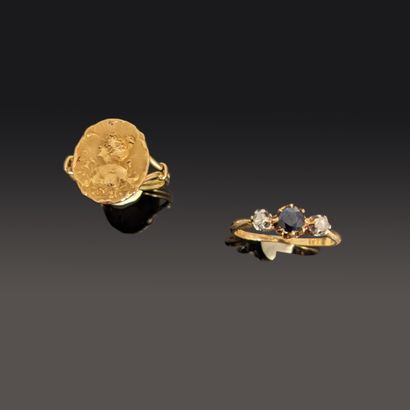 Two 18K (750) yellow gold girl's rings: 
-...