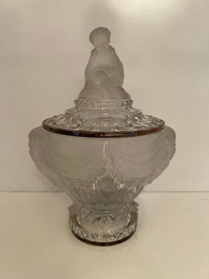 Decorated with ribs and channels, the frosted...