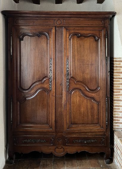 Rustic cabinet in molded natural wood. The...