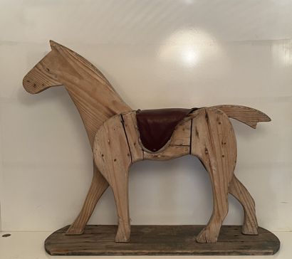 Painted wooden toy featuring a horse, the...