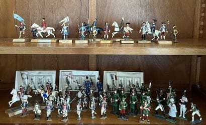 Set of lead figurines in the round featuring...
