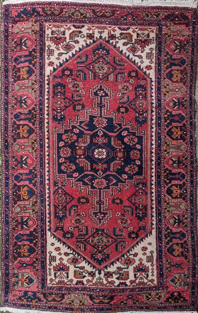 Oriental wool carpet, decorated with blue...