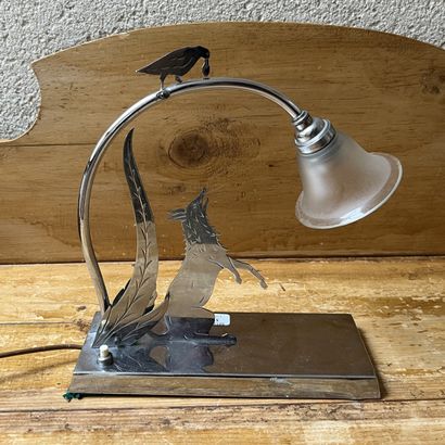 Small lamp in cut-out chromed metal, based...