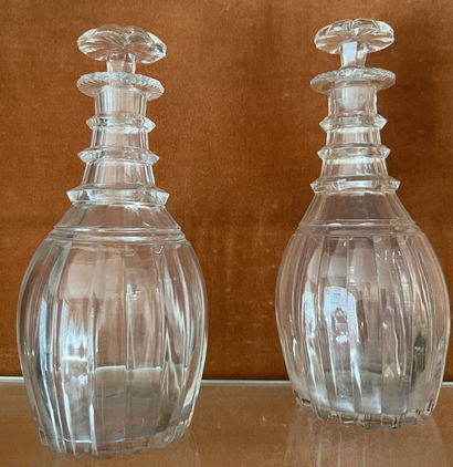 Pair of crystal carafes, the neck with rings,...