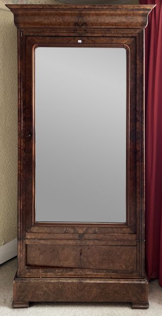 Cabinet in burled walnut veneer, the cornice...