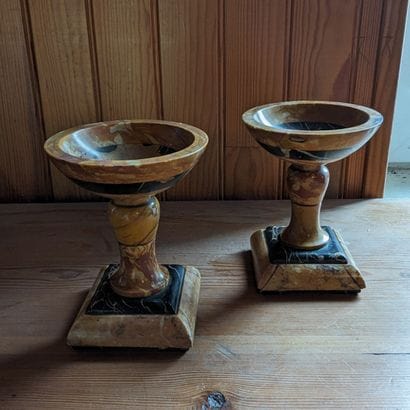 Pair of cassolettes in black and yellow marble....