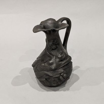 Jean GARNIER (1853-1910). Pewter pitcher...