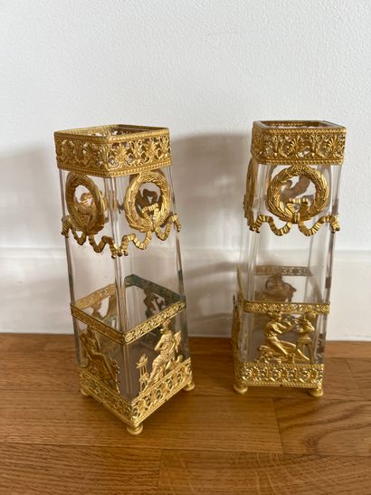 Pair of pyramid-shaped vases, the gilded...