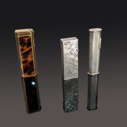 Two Dunhill silver-plated metal lighters,...
