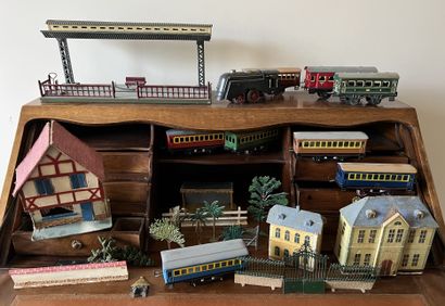 Set of model toys: painted tin railway station,...