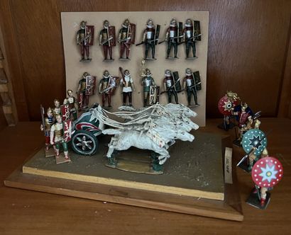 Set of lead figurines in the round featuring...