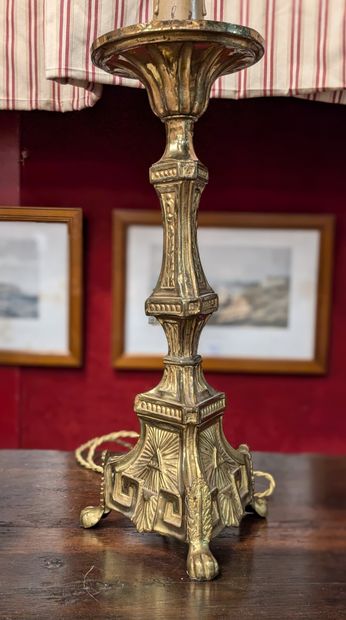 Gilded brass pique-cierge, triangular shaft...
