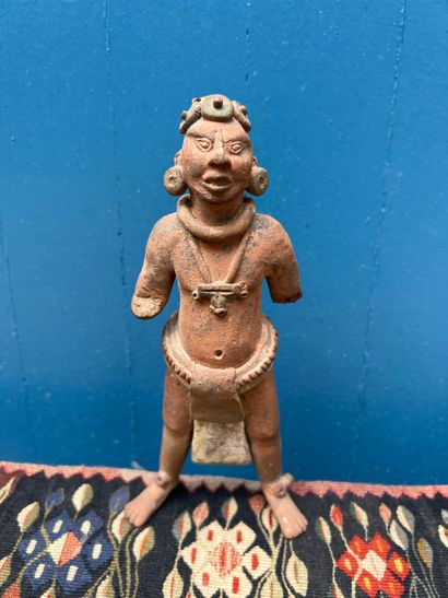 Pre-Columbian art. Statuette of a standing...