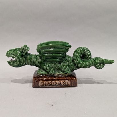Earthenware dragon statuette, base marked...