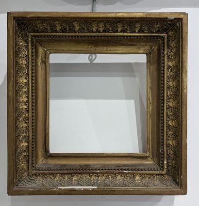 Small square frame in gilded wood, decorated...