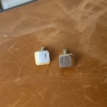 Yves SAINT-LAURENT. Pair of gilt metal and...