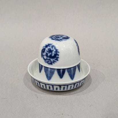 China, 20th century. Porcelain cup and saucer...