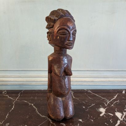 Statuette africaine en bois sculpté patiné...