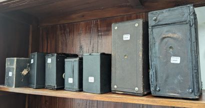 A set of cameras, most of them box cameras,...