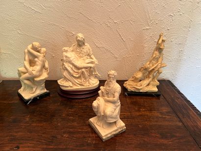 Resin group in imitation ivory representing...
