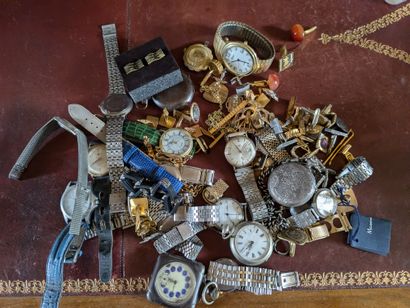 Some pocket watches and wristwatches in metal...