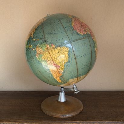 World map on a wood and metal stand. H. 45...