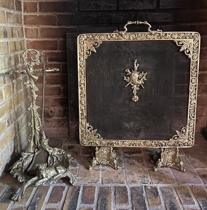 Gilded cast bronze hearth screen, the grilled...