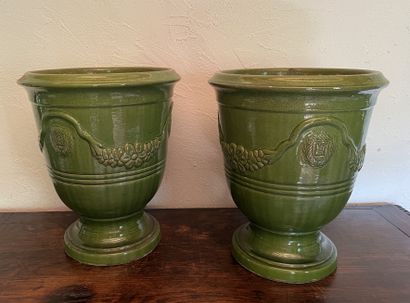 Pair of green-glazed earthenware planters...