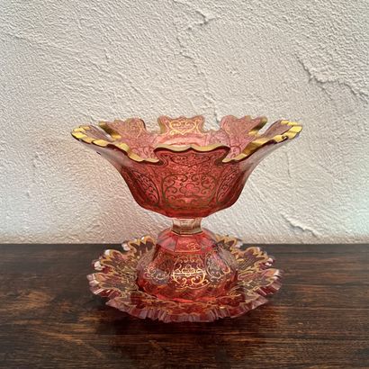 Rose-tinted crystal bowl on pedestal with...