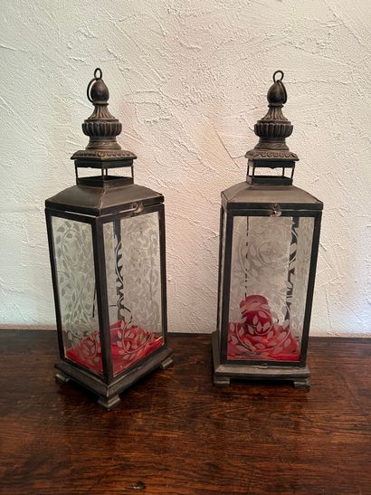 Pair of standing lanterns in patinated sheet...