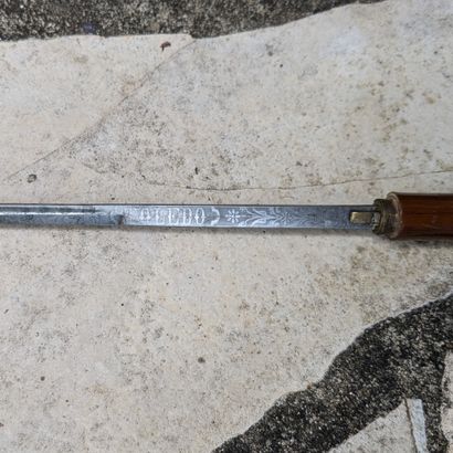 Sword cane. Varnished rushwood shaft, white...