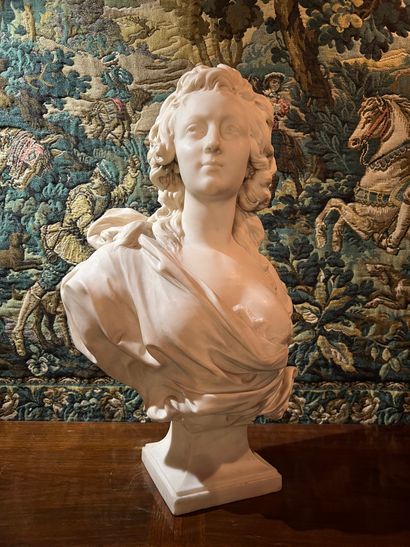 Large marble bust of a woman, one breast...
