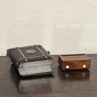 Music box featuring a photograph album (accident...