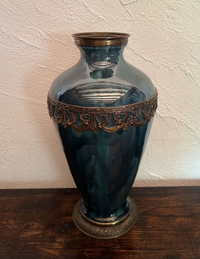 Large ovoid vase in shaded blue-green enameled...