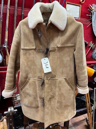 Turned sheepskin coat. Supposed size 52.