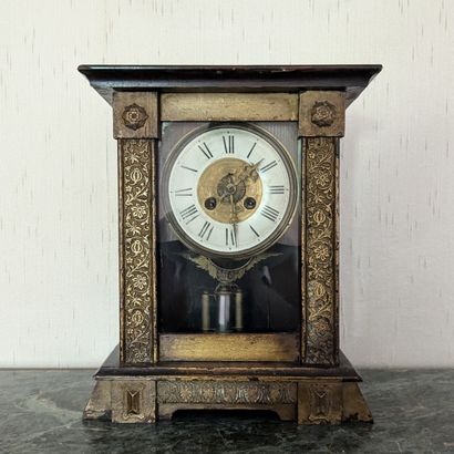 Gilded wood clock, the uprights carved with...