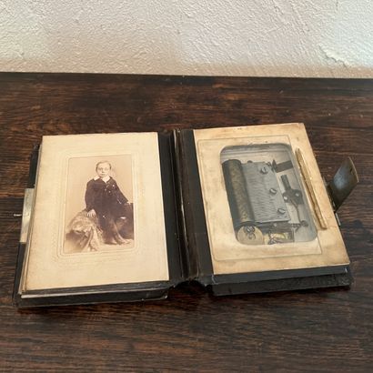 Music box featuring a photograph album (accident...