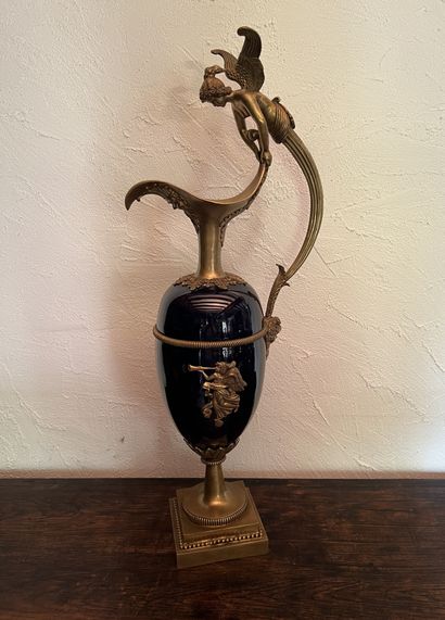 Large ceramic ewer with gros bleu and bronze...